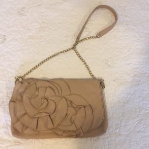 Nude colored crossbody / clutch.